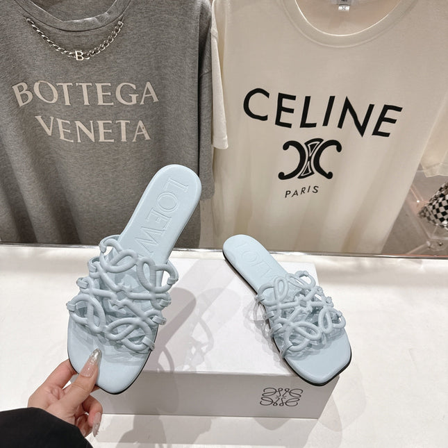 LOEWE 26S PETAL ANAGRAM SLIDE IN LIGHT BLUE CALFSKIN