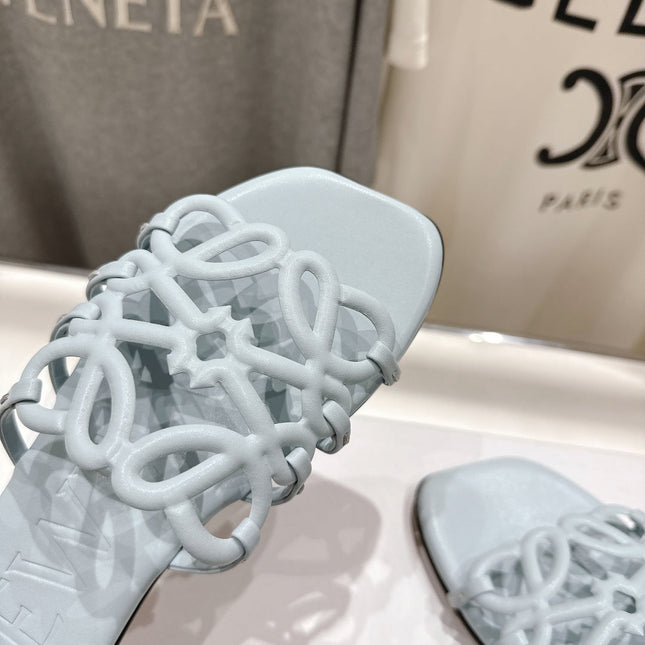 LOEWE 26S PETAL ANAGRAM SLIDE IN LIGHT BLUE CALFSKIN