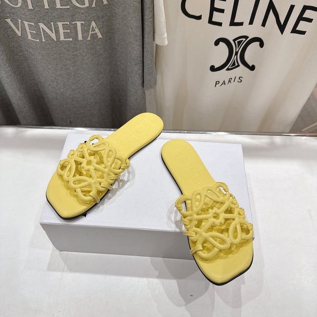 LOEWE 26S PETAL ANAGRAM SLIDE IN YELLOW CALFSKIN