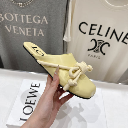 LOEWE 26S MULE LOAFERS IN BUTTER YELLOW CALFSKIN KNOT DETAIL