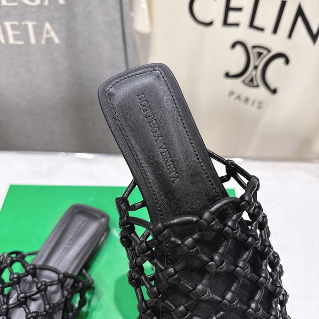 BOTTEGA VENETA 26S WOVEN MULES IN BLACK LAMBSKIN