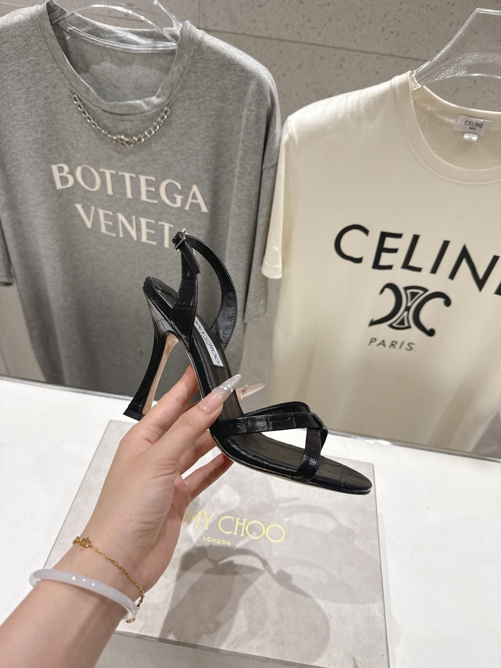 JIMMY CHOO 26S HIGH-HEELED SANDALS 100 MM IN BLACK CROC-EMBOSSED LAMBSKIN