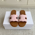 CELINE 26S TRIOMPHE SLIDE SANDALS IN LIGHT PINK CALFSKIN WITH TAN BROWN FOOTBED
