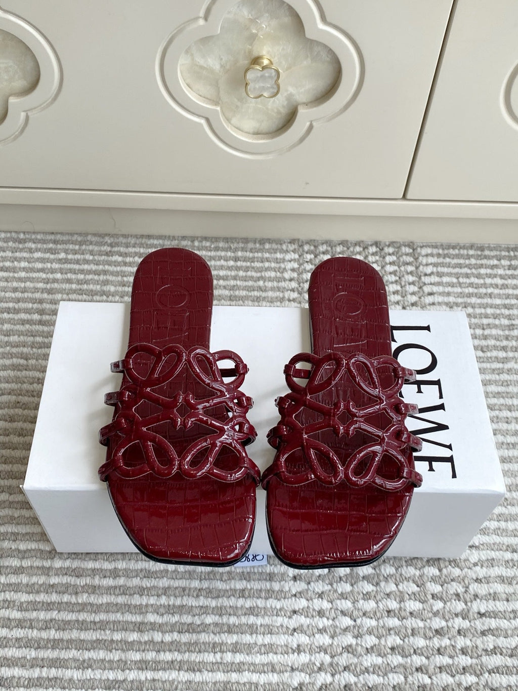 LOEWE 26S SLIDE SANDALS IN BURGUNDY RED CROC-EMBOSSED PATENT CALFSKIN