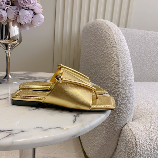 BOTTEGA VENETA 26S FLAT THONG SANDALS IN GOLD LAMBSKIN