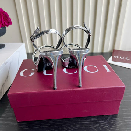 GUCCI 26S HORSEBIT GG SANDALS 105 MM IN SILVER PATENT CALFSKIN