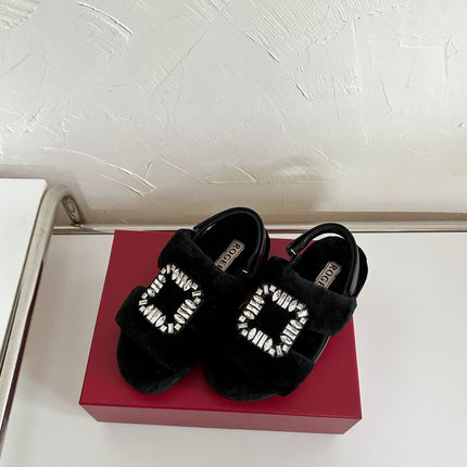 SLIDY VIV' WINTER FUR STRASS BUCKLE SANDALS IN BLACK SHEARLING
