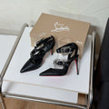 GIDDYLINA LARGE METAL BUCKLES STRAP PUMPS IN BLACK CALFSKIN