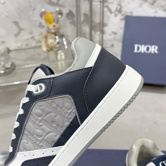 DIOR 25S B27 UPTOWN LOW-TOP SNEAKERS IN DARK BLUE MIX GREY CALFSKIN STYLE 2