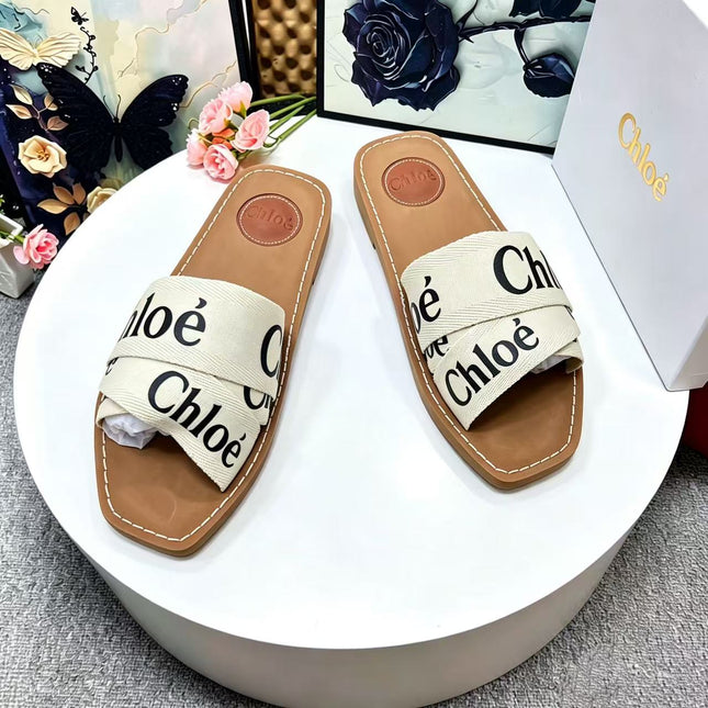 CHLOE 26S CRISSCROSS SLIDES IN BEIGE CANVAS
