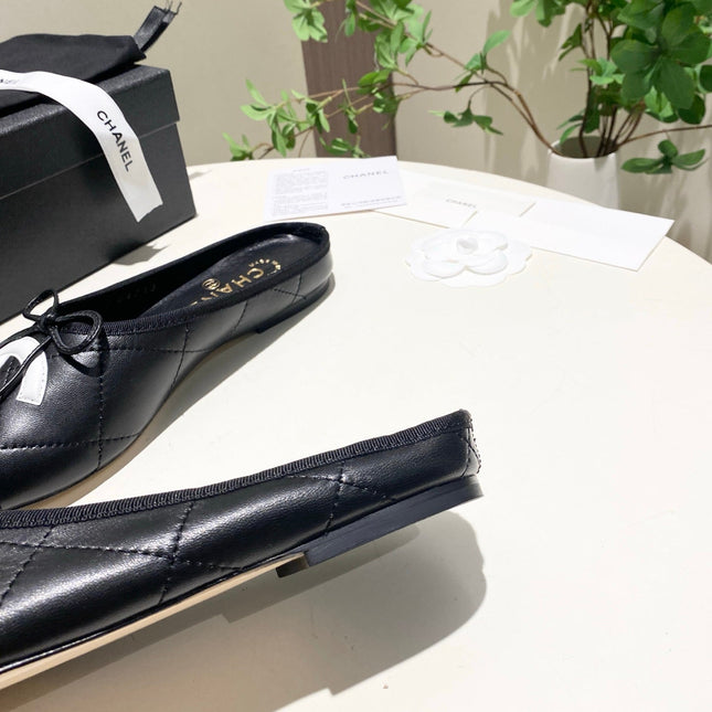 CHANEL 26S FLAT MULES IN BLACK LAMBSKIN