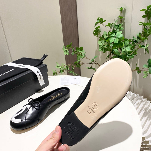 CHANEL 26S FLAT MULES IN BLACK LAMBSKIN