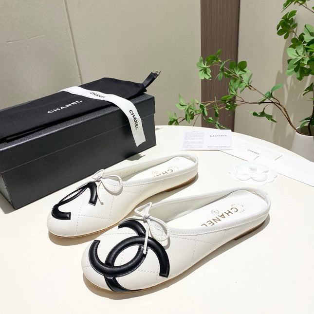 CHANEL 26S FLAT MULES IN WHITE LAMBSKIN