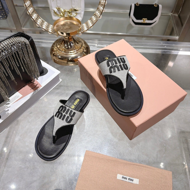 MIUMIU 26S THONG SANDALS IN WHITE CANVAS AND BLACK CALFSKIN LOGO