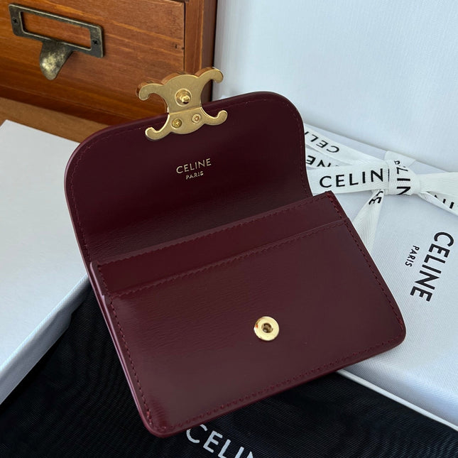 TRIOMPHE WALLET 10 IN BURGUNDY RED CALFSKIN GOLD HARDWARE