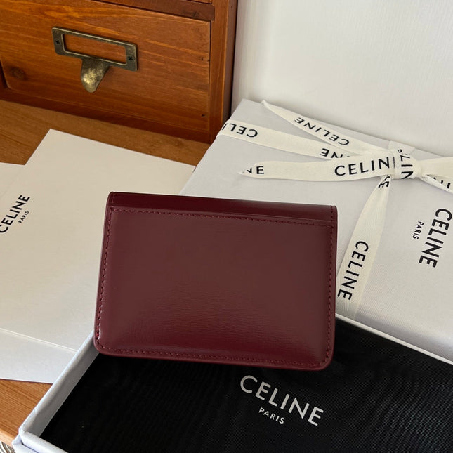 TRIOMPHE WALLET 10 IN BURGUNDY RED CALFSKIN GOLD HARDWARE