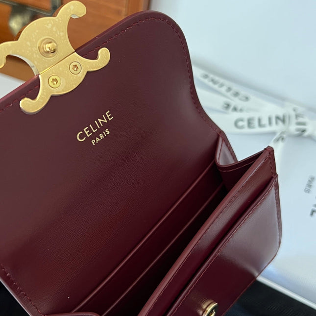 TRIOMPHE WALLET 10 IN BURGUNDY RED CALFSKIN GOLD HARDWARE