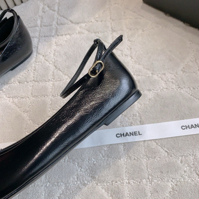 CHANEL 25S CAMELLIA SQUARE TOE FLATS IN BLACK CALFSKIN GOLD HARDWARE