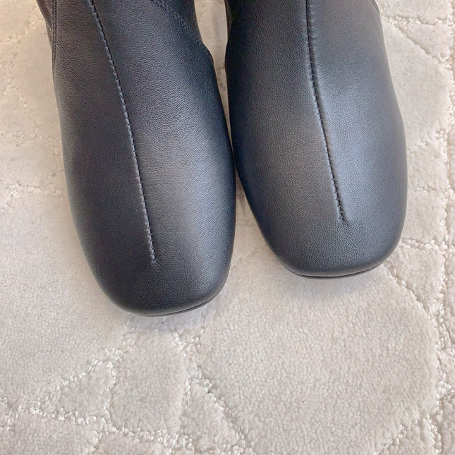 MIUMIU 26S HIGH-HEELED ANKLE BOOTS 70MM IN BLACK CALFSKIN