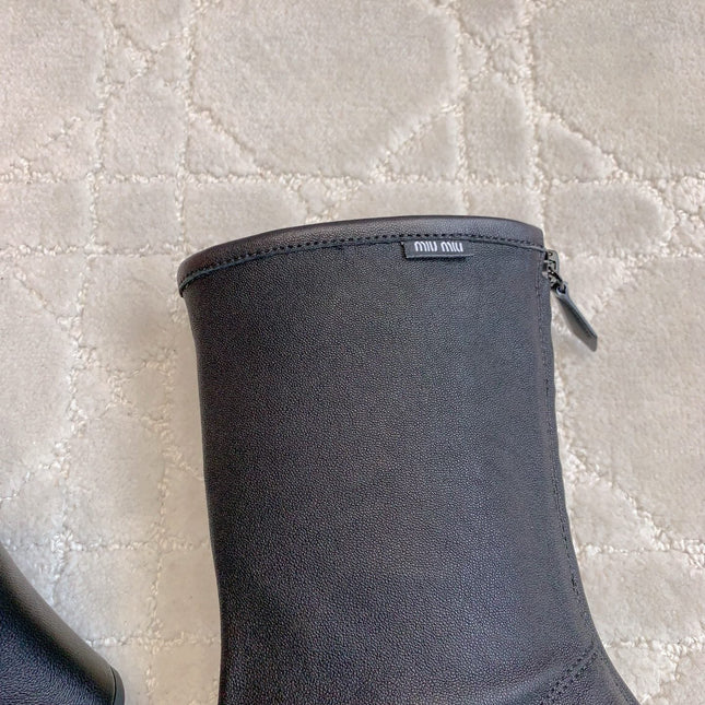 MIUMIU 26S HIGH-HEELED ANKLE BOOTS 70MM IN BLACK CALFSKIN