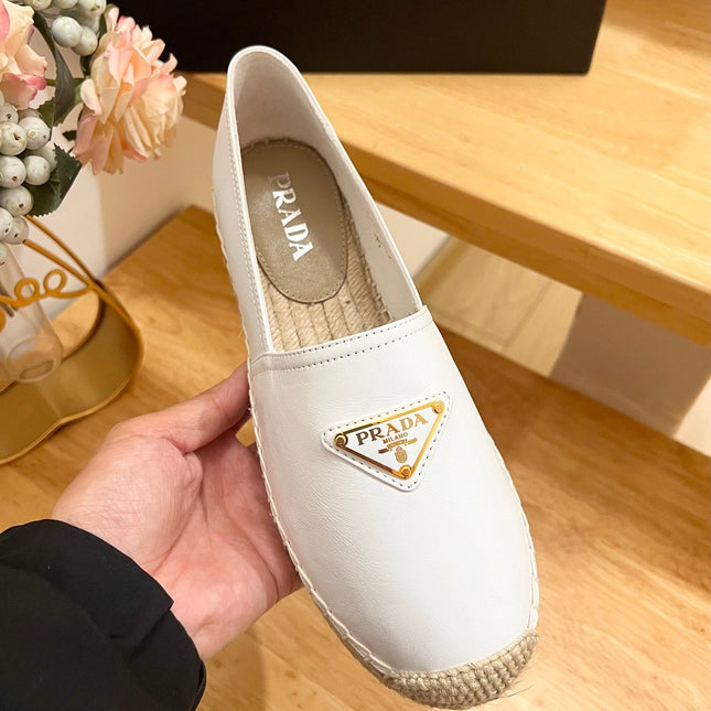 PRADA 26S LOGO ESPADRILLE SLIP ON FLATS IN WHITE CALFSKIN