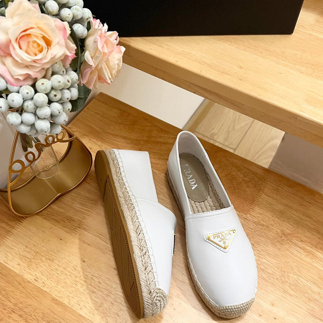 PRADA 26S LOGO ESPADRILLE SLIP ON FLATS IN WHITE CALFSKIN
