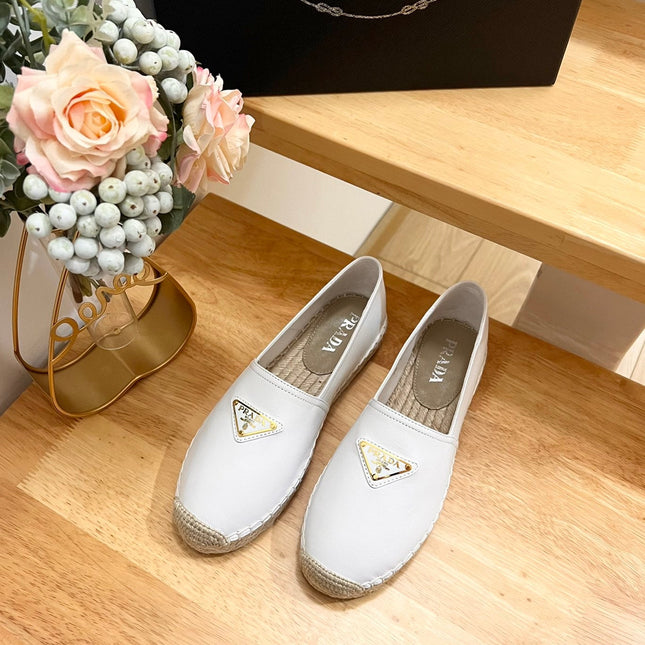 PRADA 26S LOGO ESPADRILLE SLIP ON FLATS IN WHITE CALFSKIN
