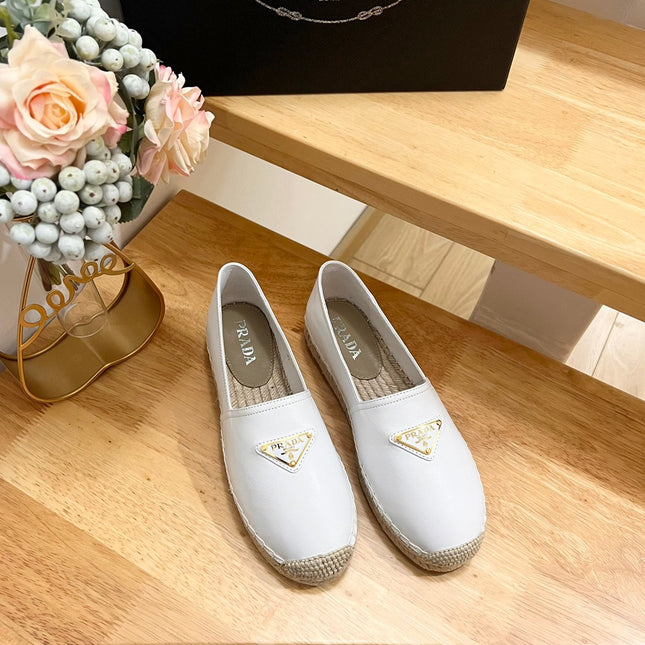 PRADA 26S LOGO ESPADRILLE SLIP ON FLATS IN WHITE CALFSKIN