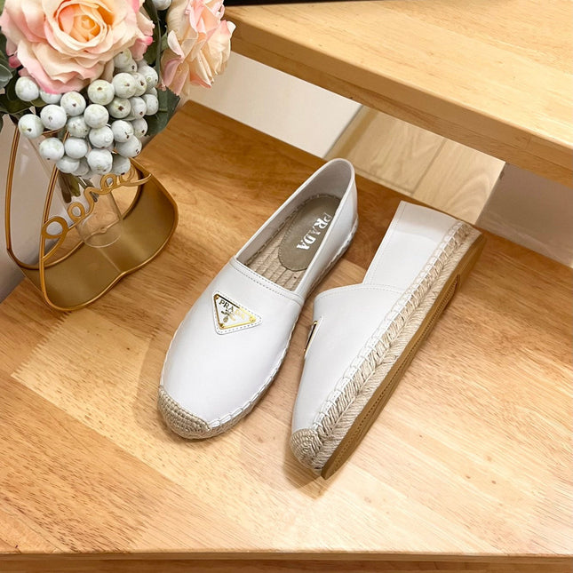 PRADA 26S LOGO ESPADRILLE SLIP ON FLATS IN WHITE CALFSKIN