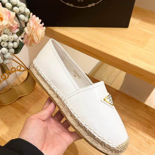 PRADA 26S LOGO ESPADRILLE SLIP ON FLATS IN WHITE CALFSKIN