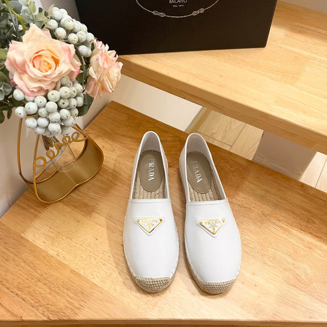 PRADA 26S LOGO ESPADRILLE SLIP ON FLATS IN WHITE CALFSKIN