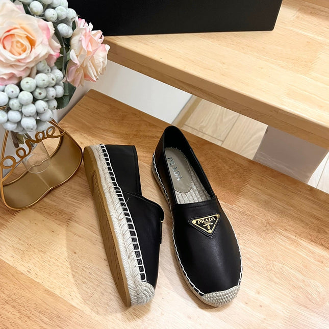 PRADA 26S LOGO ESPADRILLE SLIP ON FLATS IN BLACK CALFSKIN