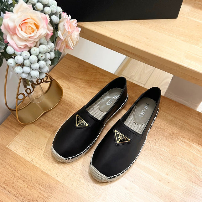 PRADA 26S LOGO ESPADRILLE SLIP ON FLATS IN BLACK CALFSKIN