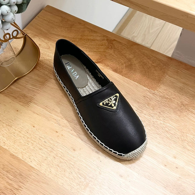 PRADA 26S LOGO ESPADRILLE SLIP ON FLATS IN BLACK CALFSKIN