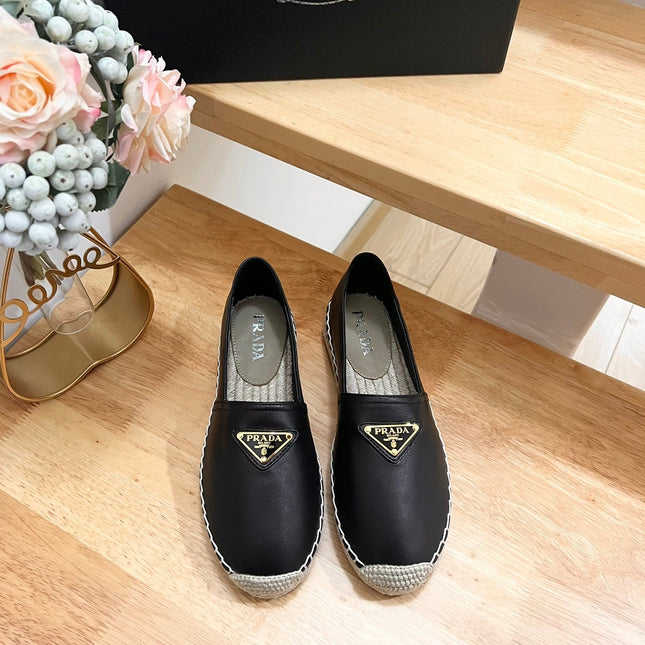 PRADA 26S LOGO ESPADRILLE SLIP ON FLATS IN BLACK CALFSKIN