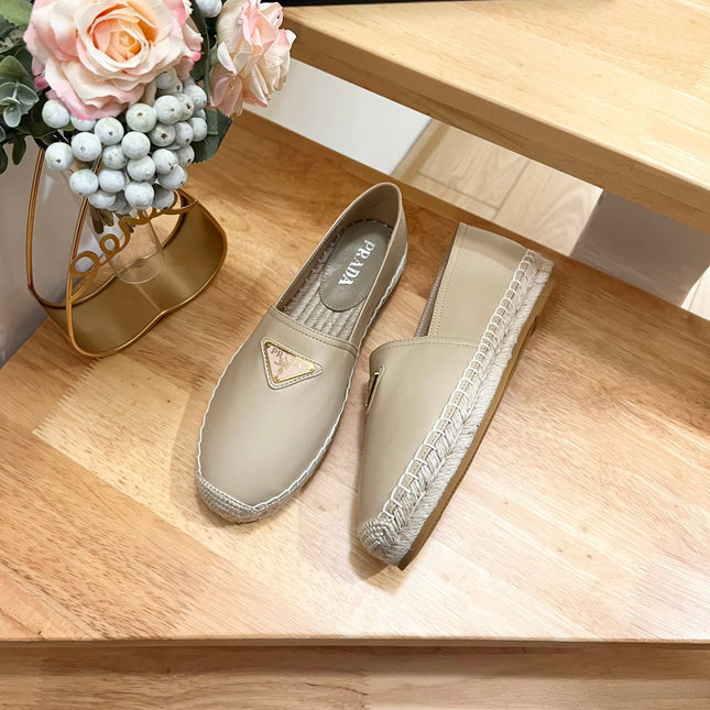 PRADA 26S LOGO ESPADRILLE SLIP ON FLATS IN DARK BEIGE CALFSKIN