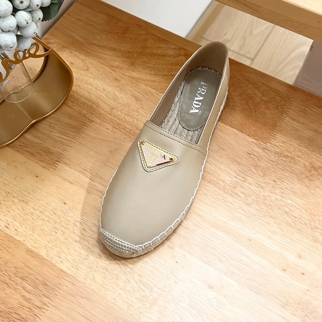 PRADA 26S LOGO ESPADRILLE SLIP ON FLATS IN DARK BEIGE CALFSKIN