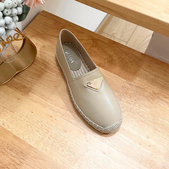 PRADA 26S LOGO ESPADRILLE SLIP ON FLATS IN DARK BEIGE CALFSKIN
