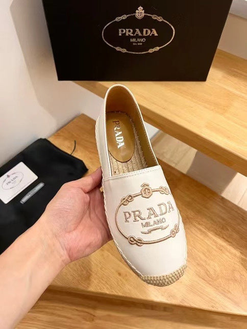 PRADA 26S EMBROIDERED LOGO ESPADRILLE FLATS IN WHITE CALFSKIN