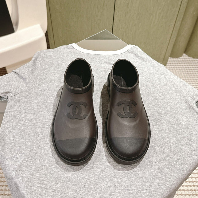 CC RAIN BOOTS IN BROWN AND BLACK TPU