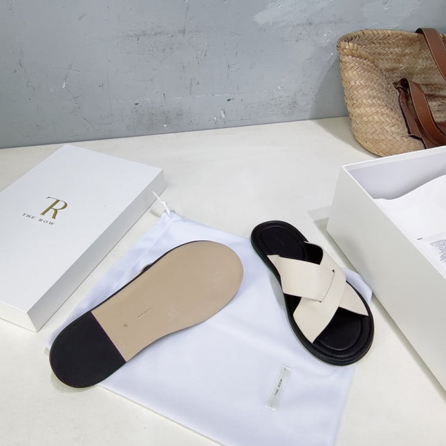 THE ROW 26S SLIDES SANDALS IN WHITE AND BLACK CALFKIN