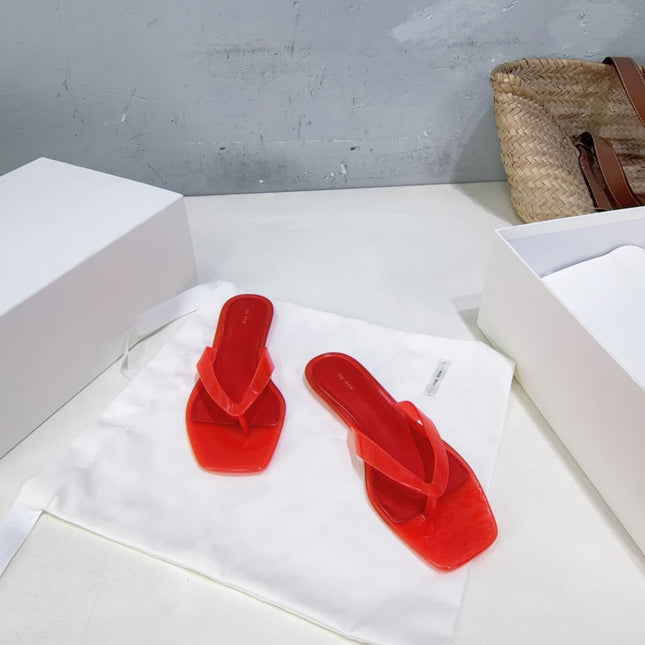 THE ROW 26S SQUARE TOE THONG SANDALS IN TRANSLUCENT RED PVC WITH SILVER FOOTBED