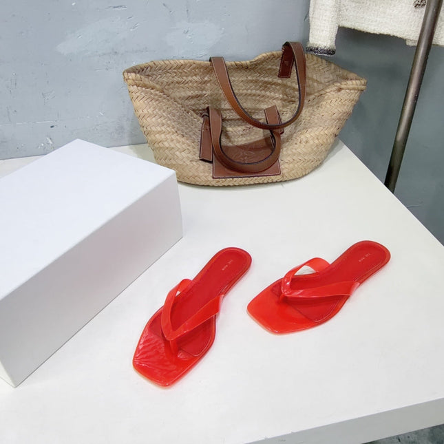 THE ROW 26S SQUARE TOE THONG SANDALS IN TRANSLUCENT RED PVC WITH SILVER FOOTBED