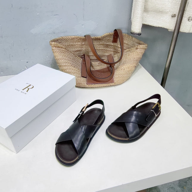 THE ROW 26S CROSS STRAP SANDALS IN BLACK CALFSKIN