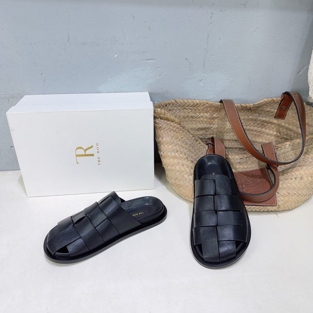 THE ROW 26S CAGE SLIDES IN BLACK SMOOTH CALFSKIN