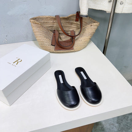 THE ROW 26S ROUND TOE MULE FLATS IN BLACK SMOOTH CALFSKIN
