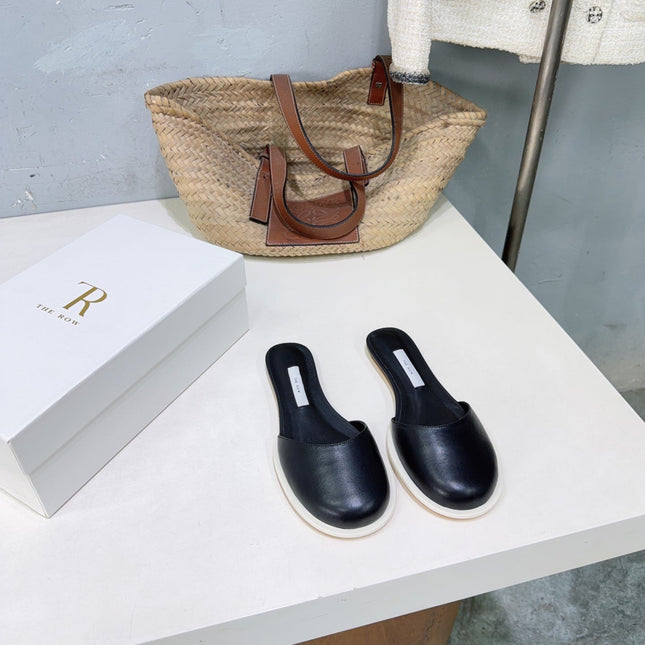 THE ROW 26S ROUND TOE MULE FLATS IN BLACK SMOOTH CALFSKIN