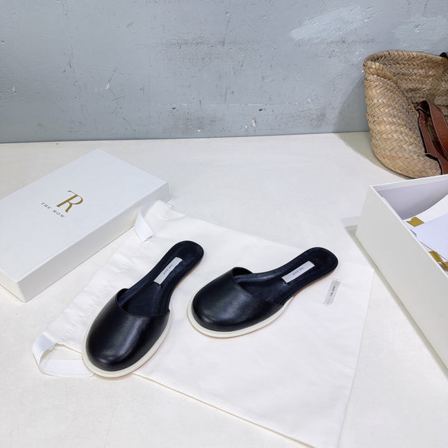 THE ROW 26S ROUND TOE MULE FLATS IN BLACK SMOOTH CALFSKIN