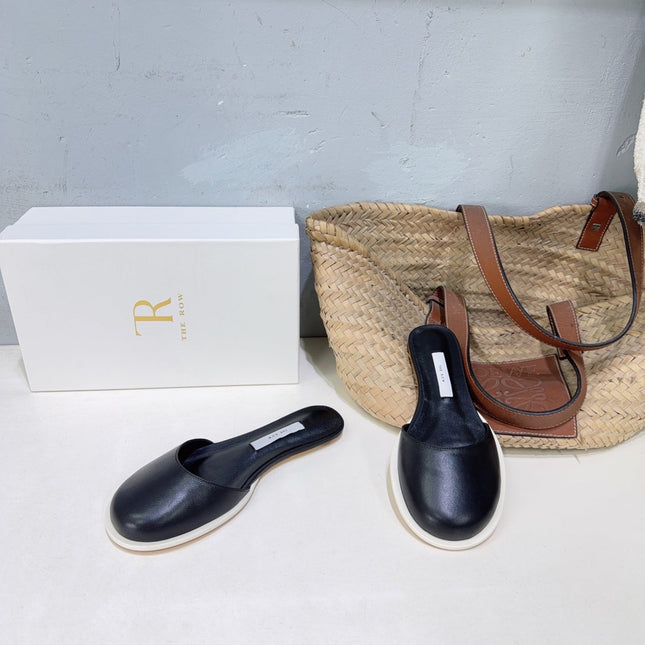 THE ROW 26S ROUND TOE MULE FLATS IN BLACK SMOOTH CALFSKIN