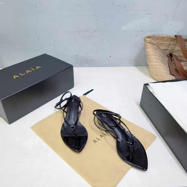 ALAIA 26S THONG SANDALS IN BLACK CALFSKIN